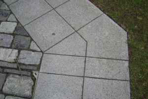 Granite paving, angled cuts to suit path direction